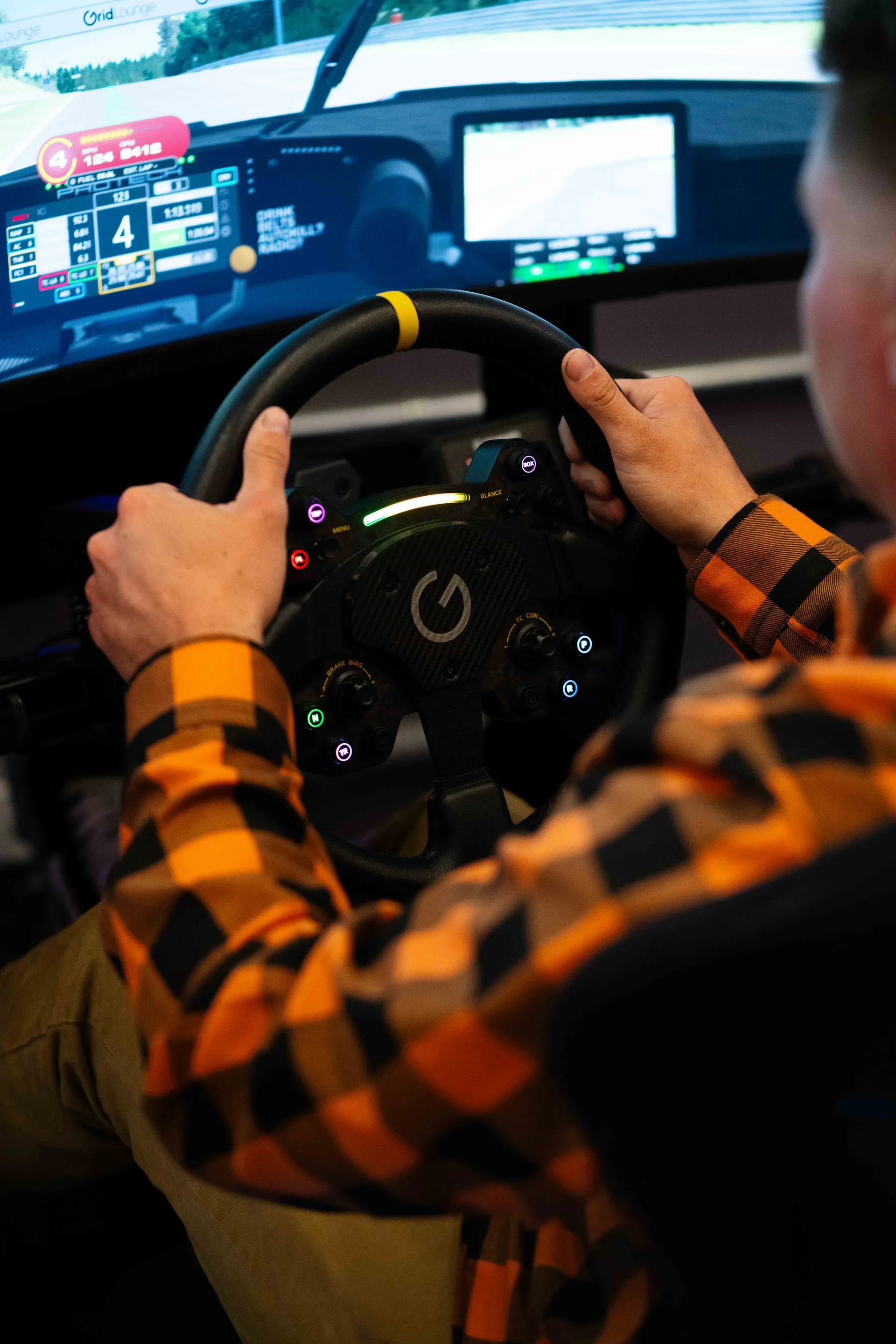 Sim racing action at Grid Lounge Cedar Falls Iowa